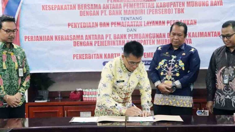 Pj Bupati Mura Teken MoU Dengan Bank Mandiri dan Bank Kalteng